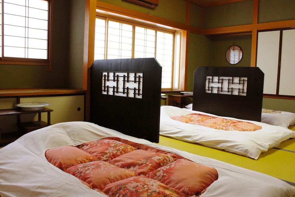 Hotel Nanzanso Izunokuni Quarto foto